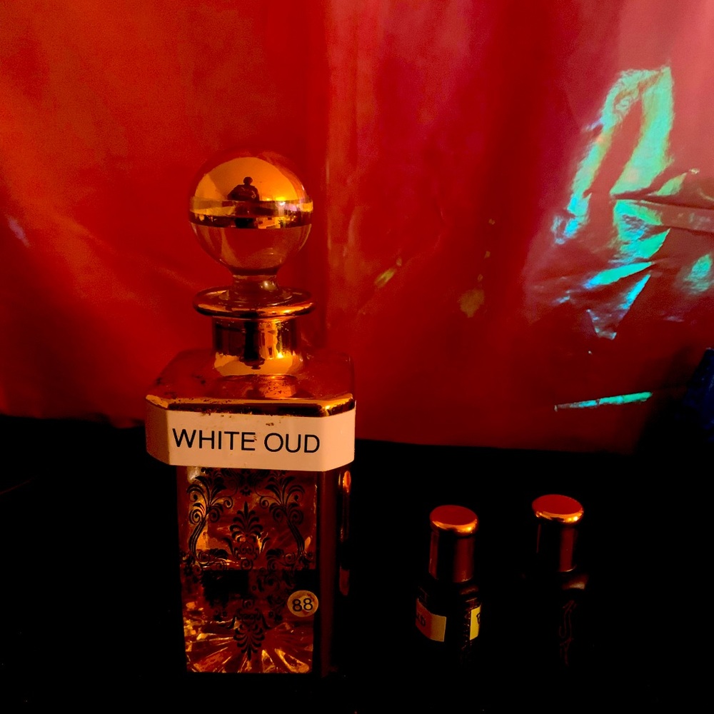White Oud fragrance oil size small black bottle